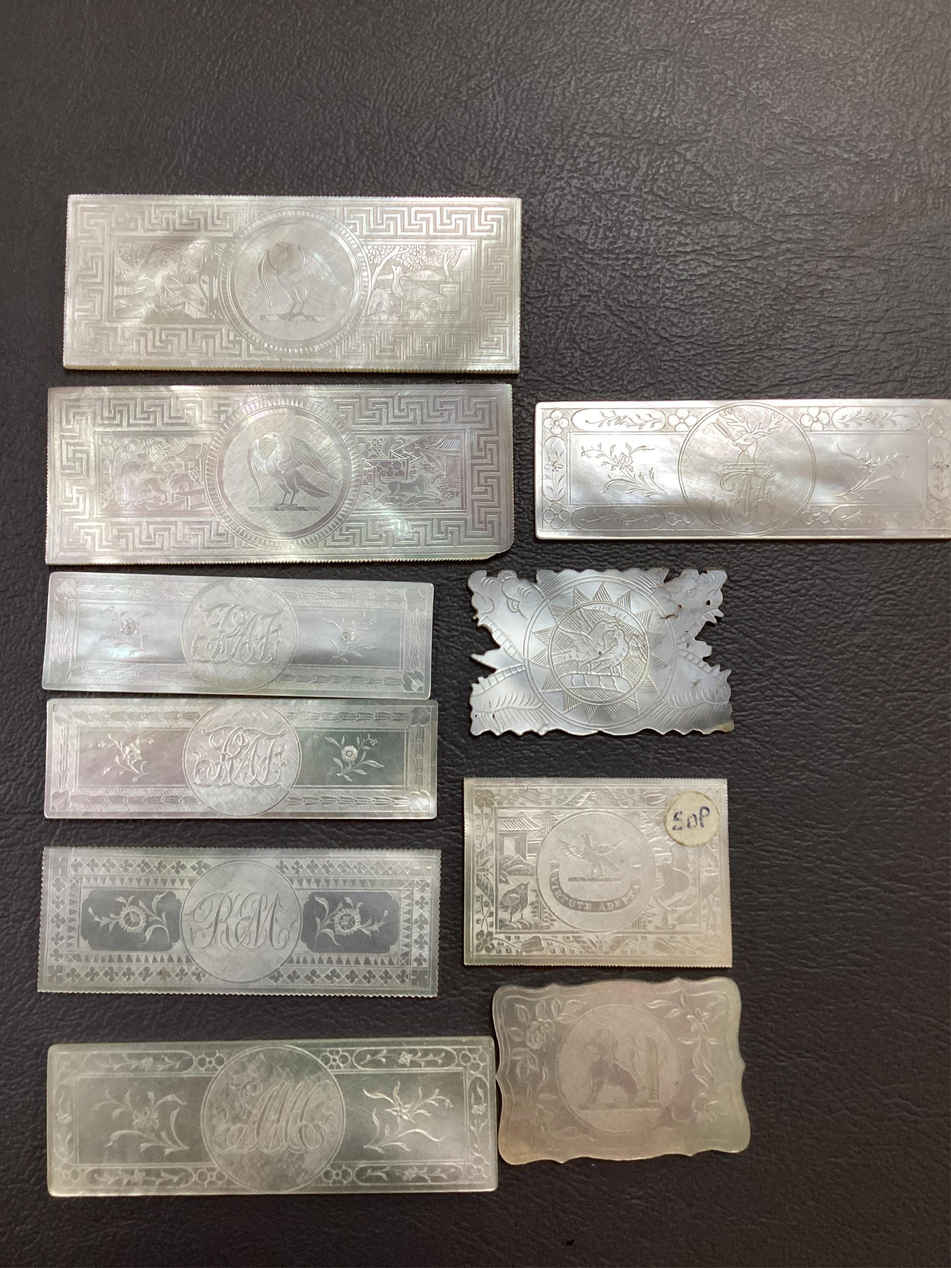 Two Chinese gilt decorated black lacquer games boxes, containing numerous mother-of-pearl counters, 19th century